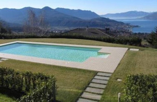 Stylishly furnished apartment in a residence with pool and dream view