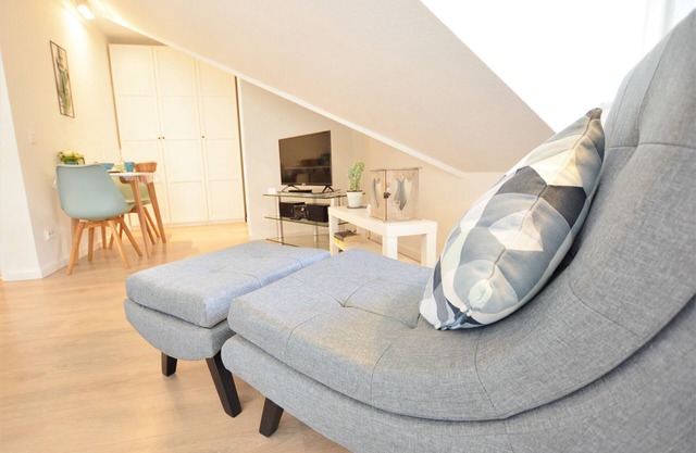 Stylishly renovated 1-room apartment - balcony, WLAN, TV, spa area