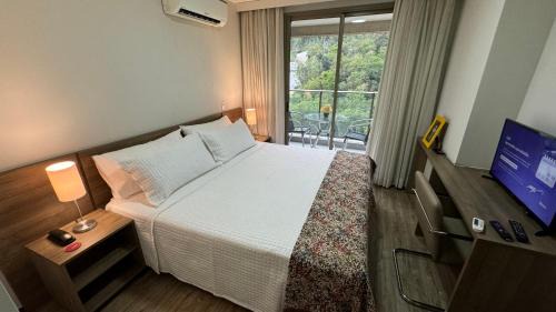 Suíte Econômica com Conforto de Luxo Próxima à Praia e aos Eventos