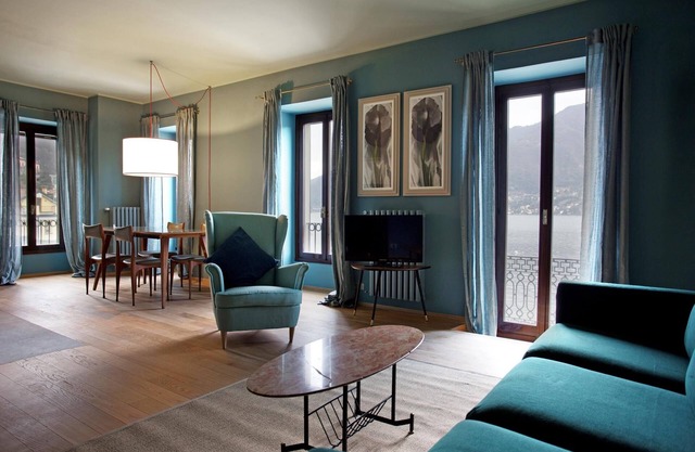 Suite "Luccio" at 2 steps from the lake with panoramic view. Lounge bar and swimming pool