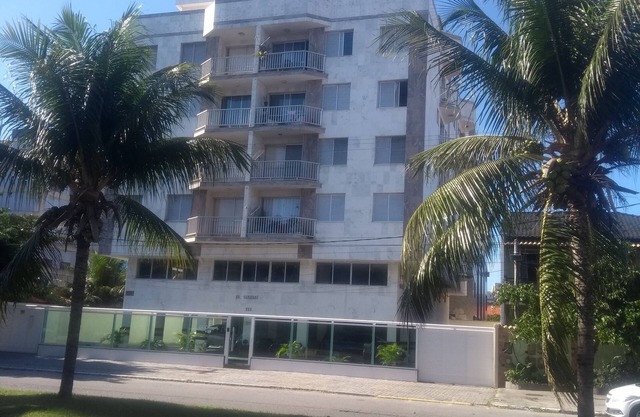 Suite with balcony and independent kitchen in apartment.