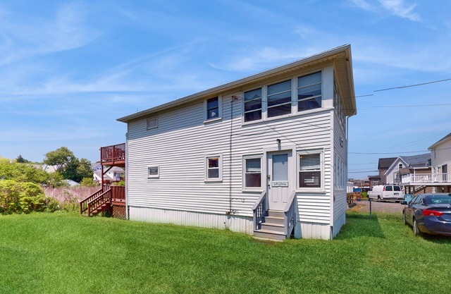 Sun-filled & serene coastal retreat with deck & stunning ocean views - near golf
