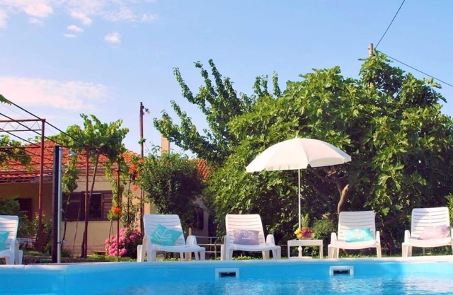 Sunflower house with pool and large garden