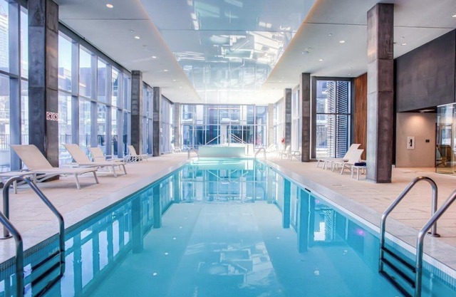 Sunny, Luxurious condo with a walk-in closet & a breath-taking view.