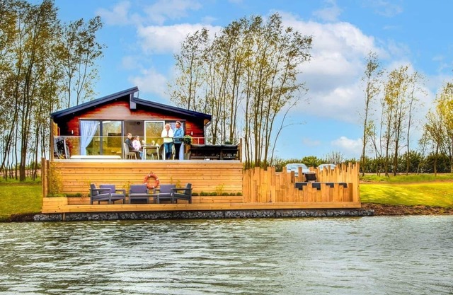 Superb bespoke lodge with two bedrooms sleeping up to four people.