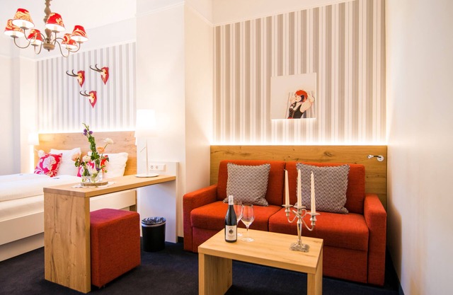Superior room with 2 beds & 1 sofa bed, max. 4 persons
