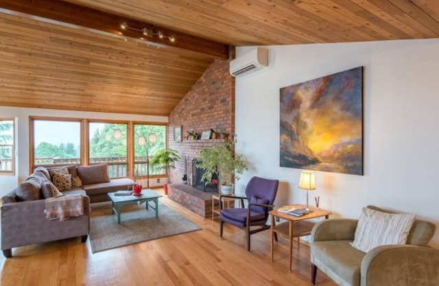 Tabor Hillside Retreat over the trees, walk to trails, and Montavilla cafes.