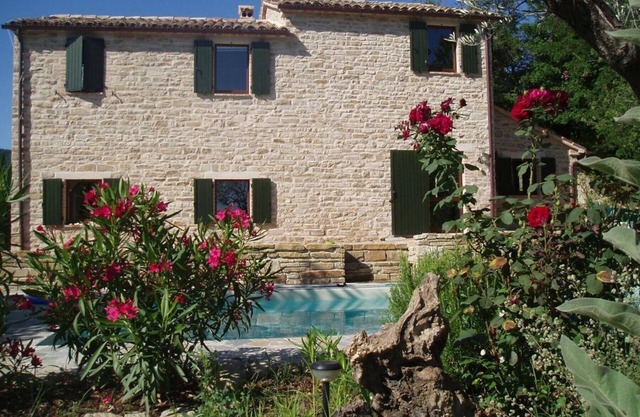 Tastefully renovated stone house with pool in a quiet hillside location with 2 apartments