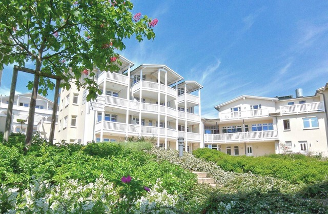 Terrace, free use of the AHOI adventure pool and sauna - Sea view apartment 77