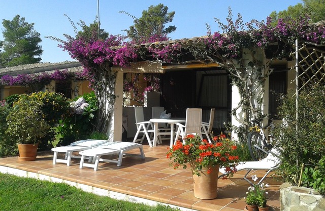 terraced house with direct access to the beach