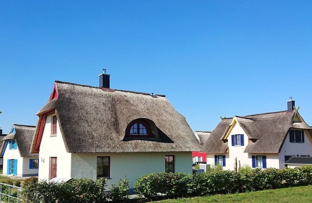 Thatched cottage on the Baltic Sea beach