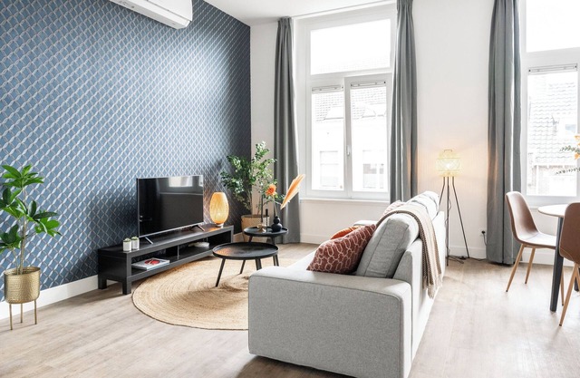 The apartment features two luxuriously appointed bedrooms.