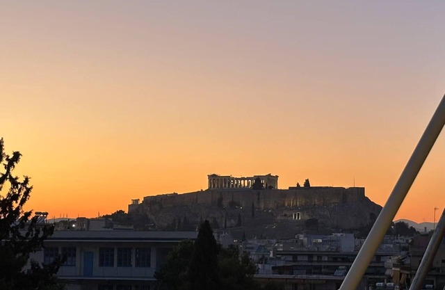 The balcony overlooks the Acropolis close to attractions and supermarket