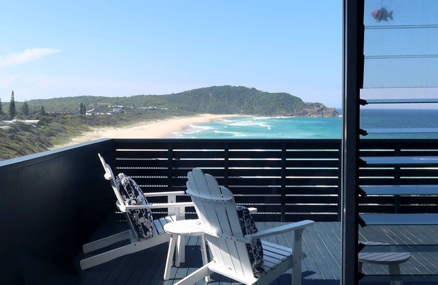 The Beach House, a stunning holiday home perched atop on the southern headland Boomerang Beach