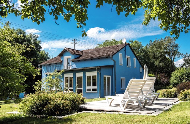 The Blue House - surrounded by greenery