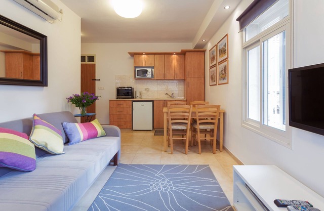 The Blue is a one-bedroom apt, on upper floor with a sleeping up to 4 guests.