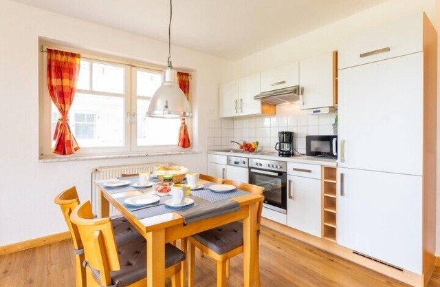 The bright and modern apartment has a living space of approx.
