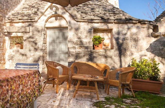 The Dairy Trullo On Top Of A Hill, In The Heart Of A Village