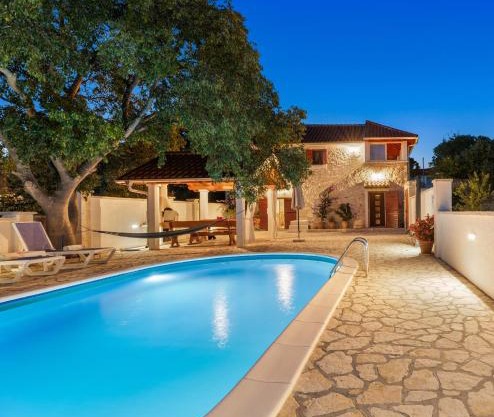 The Grandfather's courtyard villa with heated pool