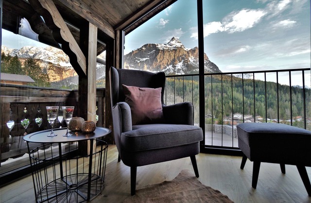 The Hof Chalet on the Zugspitze with mountain views, private garden, hot tub, sauna.