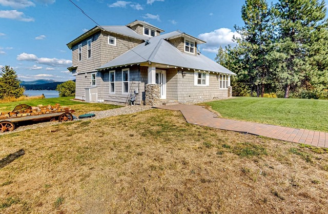 The Lakeside Farmhouse | Historic charmer with private dock & covered patio