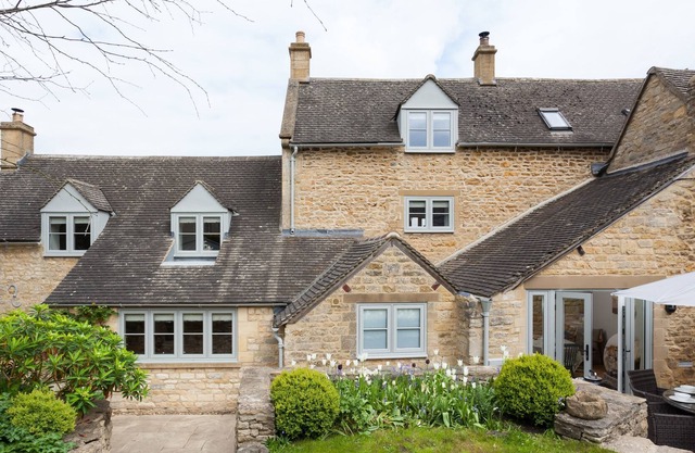 The Nook boasts pretty views over the stunning Cotswolds rooftops in the village of Guiting Power