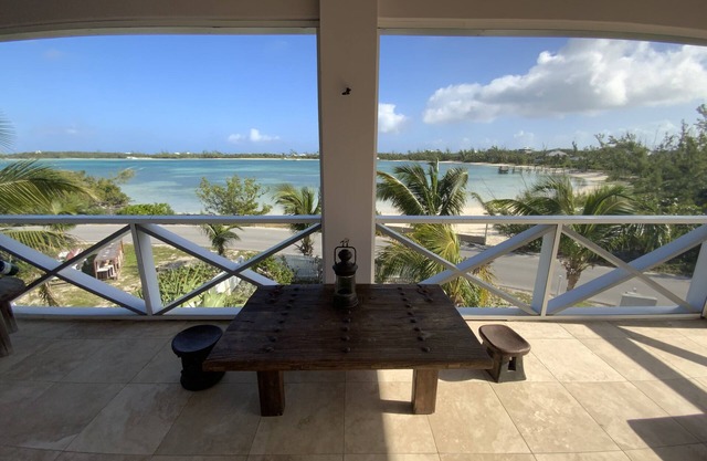 The Penthouse with sweeping views of Cocoa bay beach , green turtles & Rays
