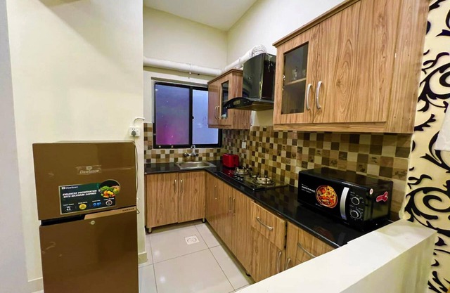 the Realtors inn Luxurious 1bed Apartment dha 2