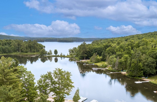 The ultimate lake front with beach, family fun getaway with endless activities!