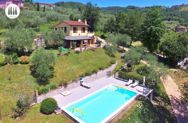 The vacation home is nestled in the Tuscan countryside with a private pool