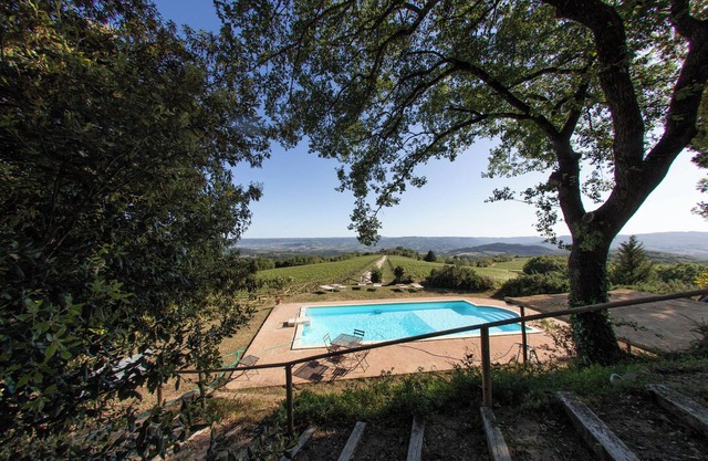 The villa offers a cozy oasis of relaxation with a panoramic swimming pool.