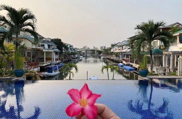 The villa with dock is 5 minutes from the beach