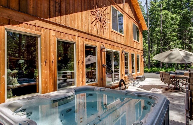 Theater, Hot Tub & River Access. This home was built for big groups!