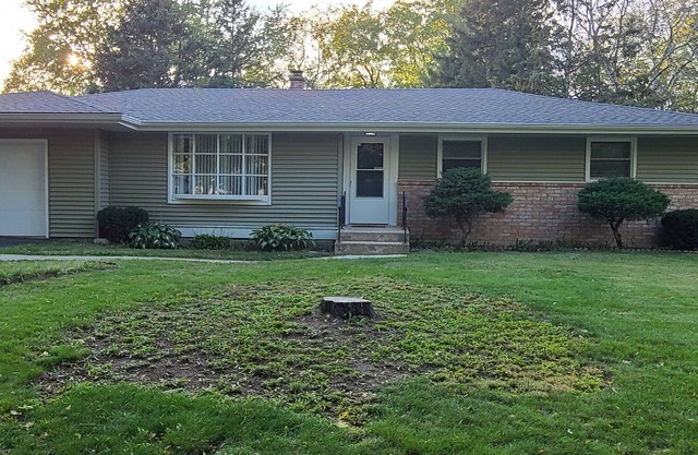 This 4 BR Home With A Great Game Room Is Located Close To Shopping And Dining