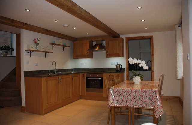 This attractive cottage has been decorated with pretty touches and nestles in a beautiful area.