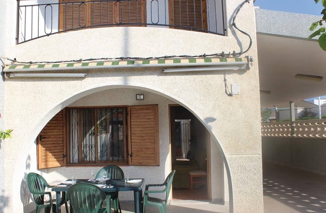 This beautiful vacation semi-detached house in the urbanization Bahía in Puerto de Mazarrón is very