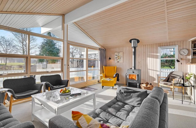 This beautiful wooden house is located in a smaller cottage area, nestled in beautiful nature.