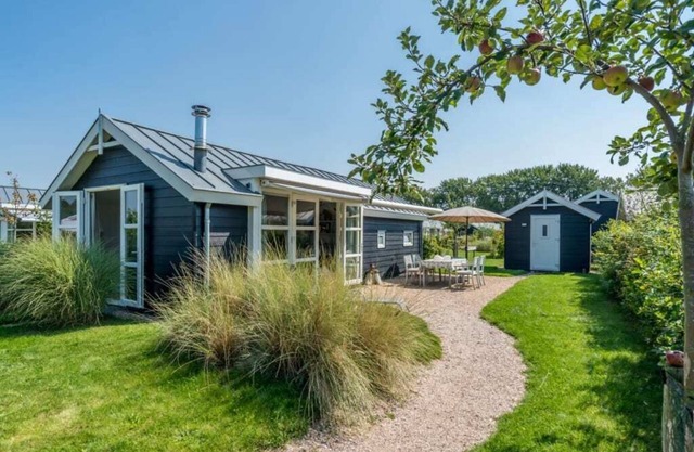This chalet has an extra spacious living room and two sitting areas, one of which is situated by the