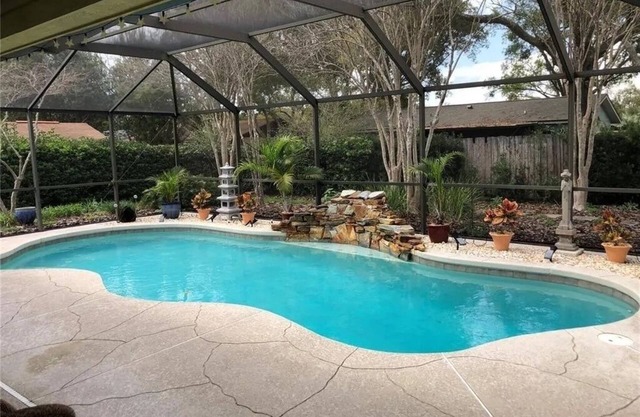 This Charming House with an outdoor pool, 3 bedrooms, 2 full baths.