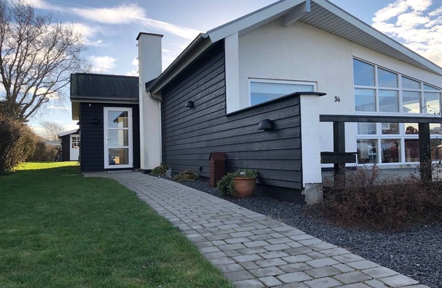 This family-friendly house on the Baltic Sea offers sea views and proximity to the beach