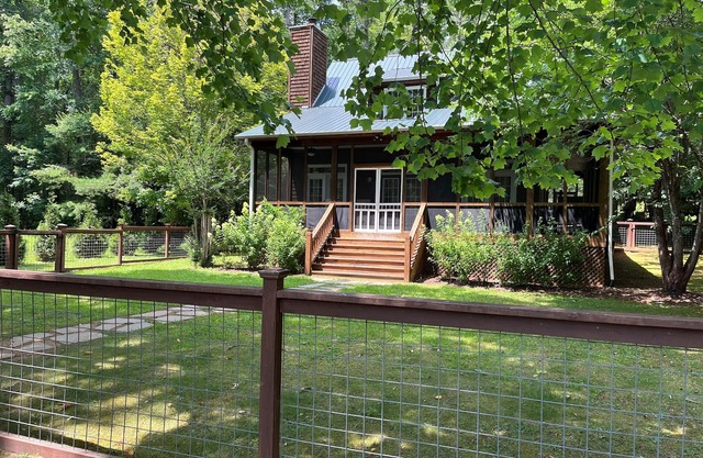 "This house lives for the lake!” Flat, fenced-in yard, no stairs to Lake Rabun.