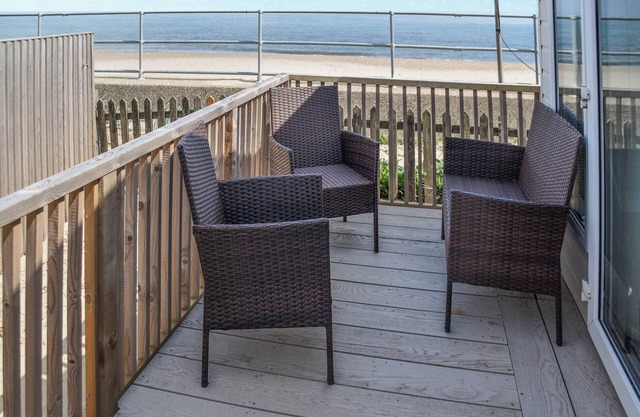 This seaside retreat blends modern comfort with spectacular sea views.