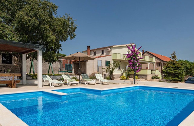 This spacious vacation house consists of the first floor and the second floor, which are connected b