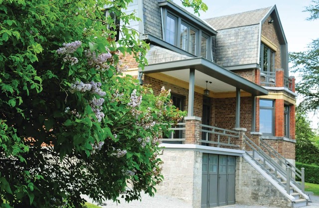 This vacation home is located in a large garden with beautiful garden furniture.