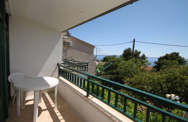 Three bedroom apartment with terrace and sea view Makarska (A-6791-a)