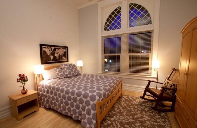 Three — Queen Bed, Historic Downtown Apartment in Nicely Appointed Building on Main Street