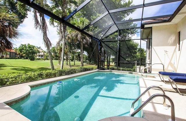 Tin Cup - Beachview Estates home with pool on golf course