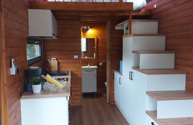 Tiny house on the campsite with fishing park