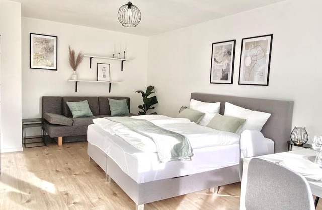 Top-Apartment mit Parkplatz und Balkon