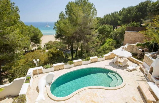 Top Holiday villa with pool, 1st line on the beach - unique in Ibiza